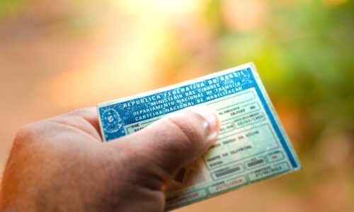 August 28, 2019, Brazil. Man holding document "Carteira Nacional de Habilitação" (CNH). A driver's license attests to a citizen's ability to drive land motor vehicles.