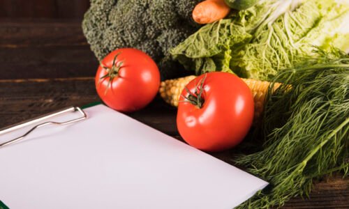 blank-clipboard-fresh-raw-vegetables-desk