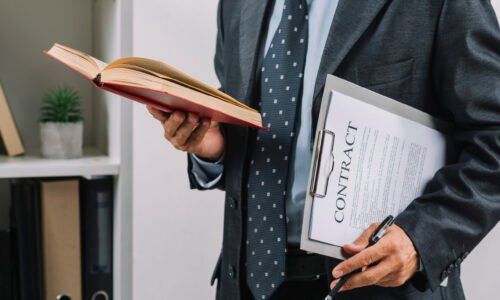 businessman-holding-book-clipboard-with-contract